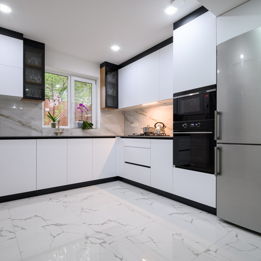 A recently renovated kitchen with sleek, modern appliances